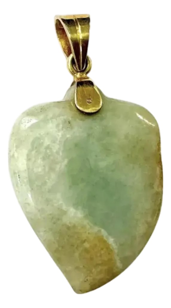 14k Gold and Natural Jade Heart Pendant: Mid-20th Century 14K Gold and Natural Jade Heart Pendant. Pendant showcases the timeless beauty of jade's organic coloration. The polished jade stone displays a unique blend of sage green and warm bro