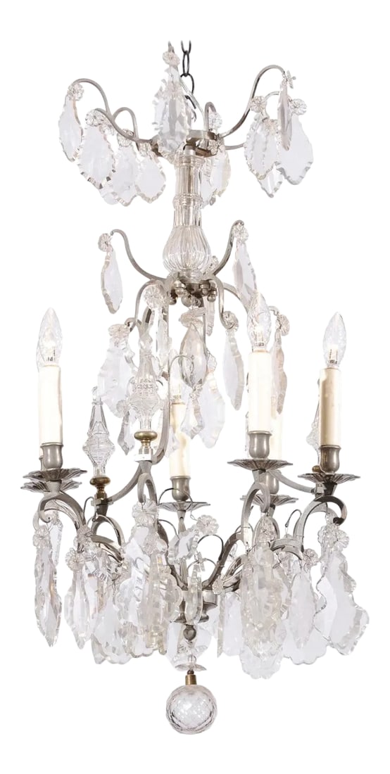 19th Century French Six-Light Crystal Chandelier with Silvered Iron Armature: A French six-light crystal chandelier from the 19th century, with silvered iron armature. Born in France during the 19th century, this exquisite chandelier presents a tiered Silhouette made of