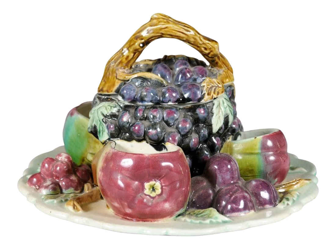 French 19th Century Glazed Majolica Lidded Fruit Dish with Grapes: A French Majolica fruit dish from the 19th century with lid. Born in France during the politically dynamic 19th century, this dish attracts our attention with its delicate arrangement of
