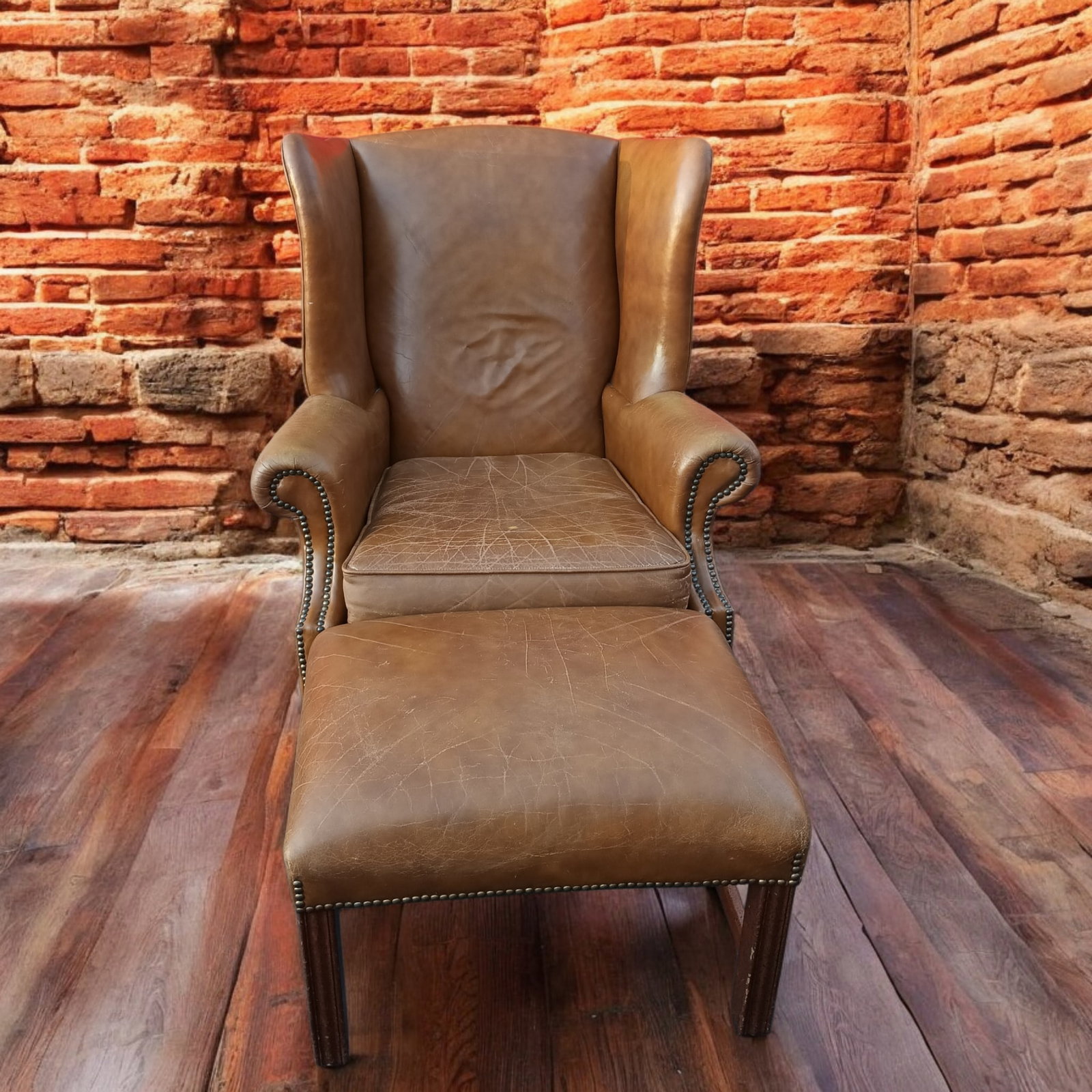 Wingback Leather Armchair and Matching Ottoman by Classic Leather. - 9