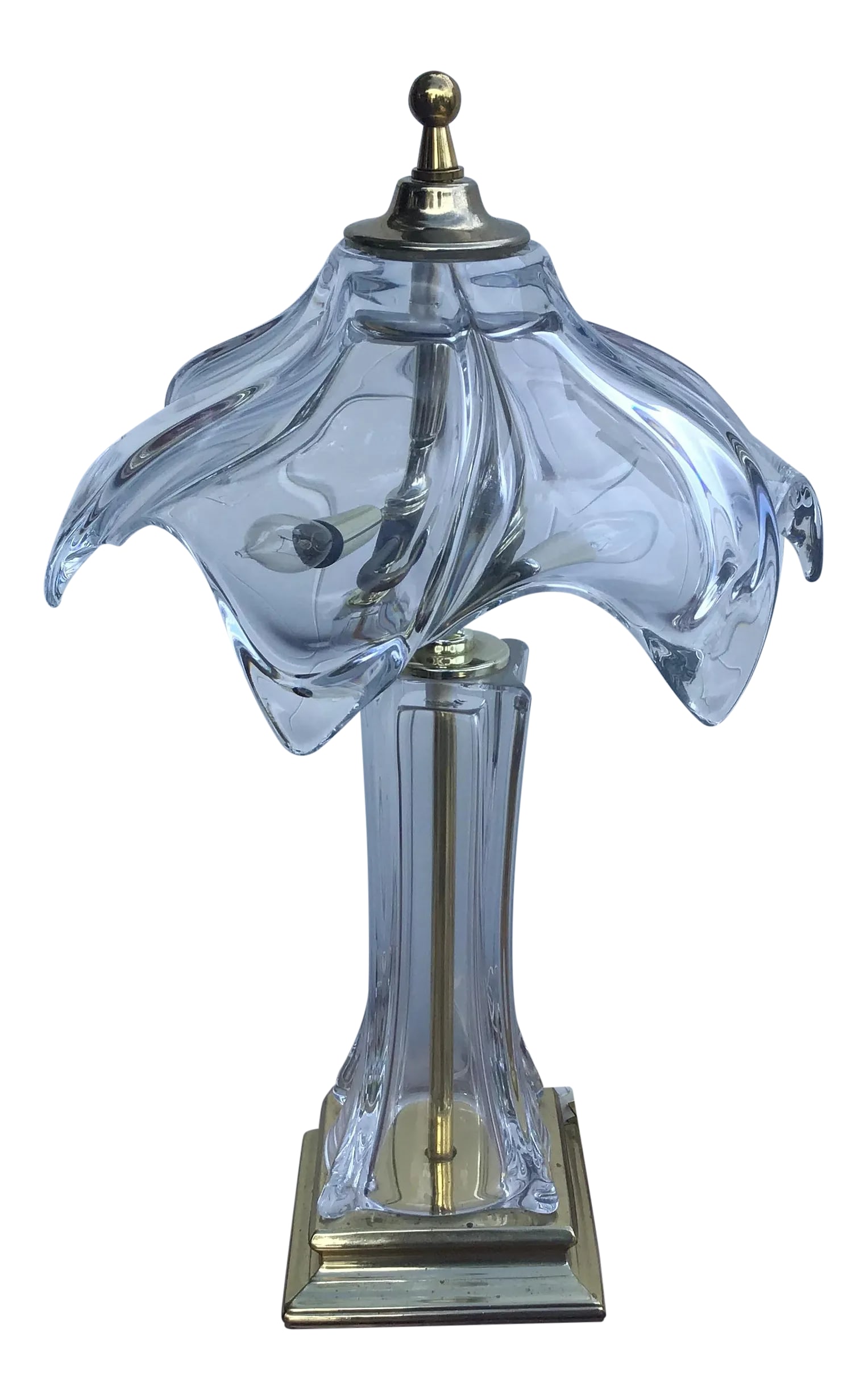 1970's Cofrac Art Verrier Hand Blown Heavy Crystal and Brass Table Lamp: Brass plated metal and thick clear crystal table lamp from the 1970s. Hand crafted in France by the Cofrac Company. It is made of heavy weight crystal and looks just beautiful when lit. The lamp is