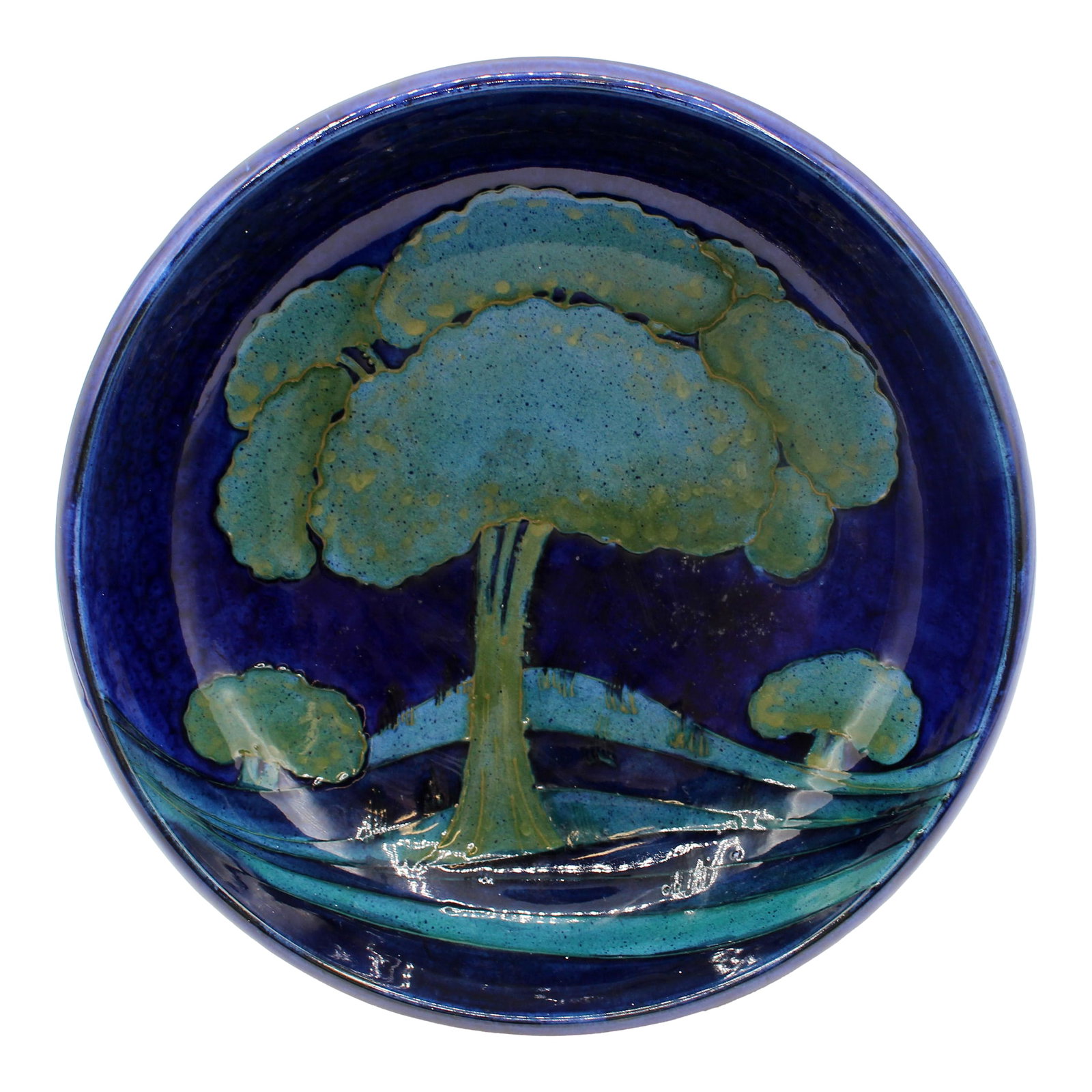 Circa 1925 "Moonlit Blue" Ceramic & Pewter Compote Bowl by Moorcroft, England: Circa 1925 Moorcroft "Moonlit Blue" ceramic & pewter compote bowl, England. Arts & Crafts period, made for Liberty's. Large tree with stylized landscape in a deep blue background. The trees encircle