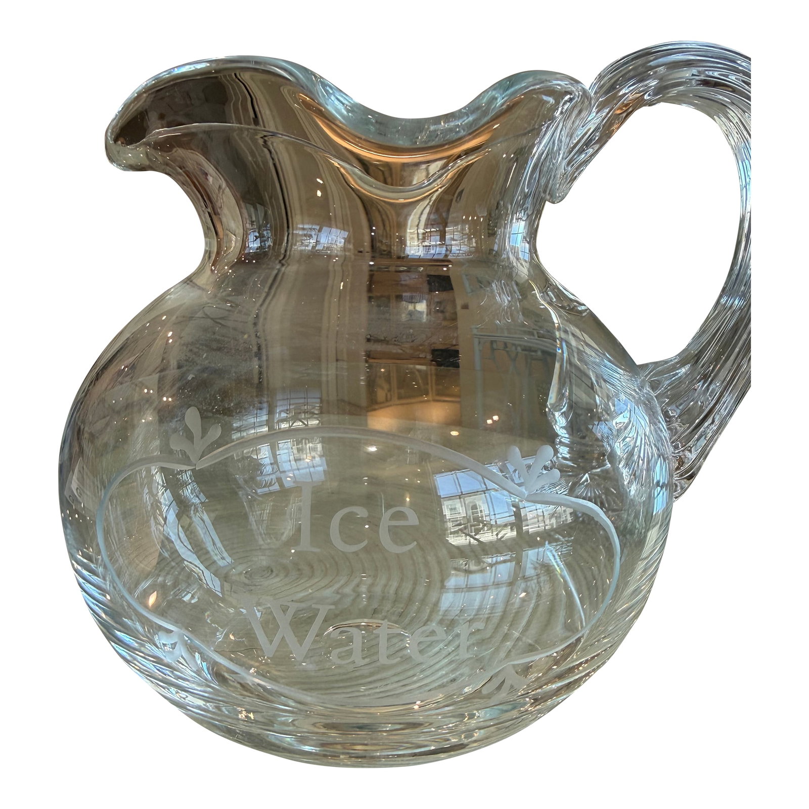 William Yeoward Vase and or Water Pitcher: Elegant and timeless, this authentic William Yeoward hand-blown glass pitcher features beautifully crafted ribbed detailing on the handle and the refined proportions for which Yeoward glassware is