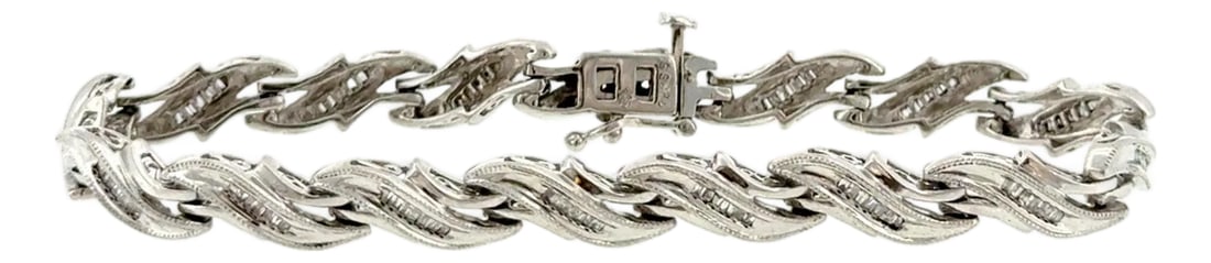 Silver 925 Diamond Baguette Tennis Bracelet: Elegant Sterling Silver 1.00ctw Diamond Baguette Tennis Bracelet Add a touch of timeless sophistication to your collection with this stunning 925 Sterling Silver tennis bracelet. Featuring