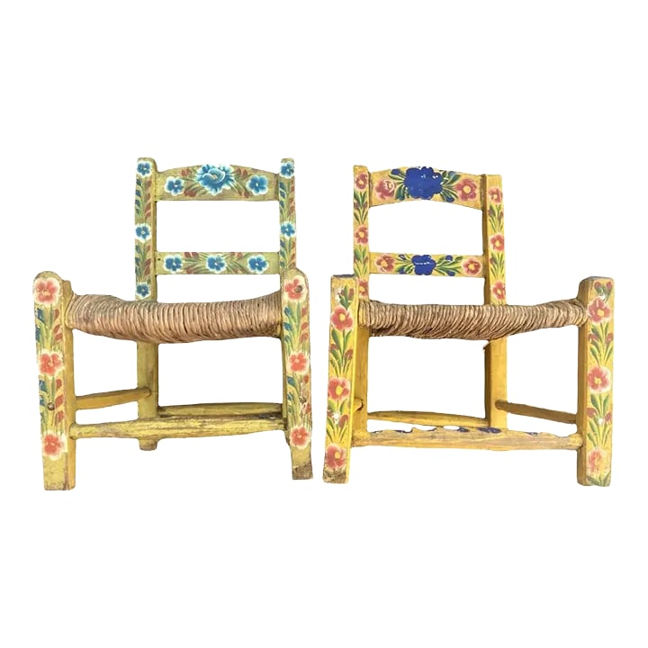 Vintage Mexican Doll's Chairs - Hand Painted With Rush Seats - Mid 20th Century: These vintage chairs are for dolls. They also make a beautiful accent hanging on a wall, especially a stucco wall. Condition: Alterations: Original Condition Unaltered Imperfections: Some