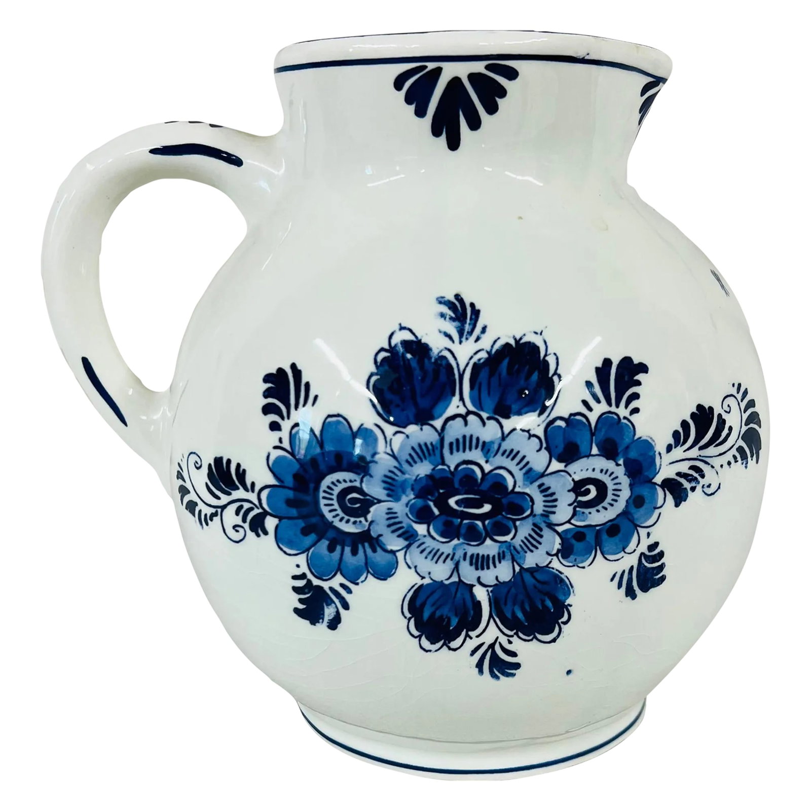 Late 20th Century Blue Delft Pitcher With Floral Pattern: Pot belly blue Delft pitcher with floral pattern. Mark shown in pictures. Condition: Alterations: Original Condition Unaltered Imperfections: Some Imperfections Condition Notes: Normal crazing. No