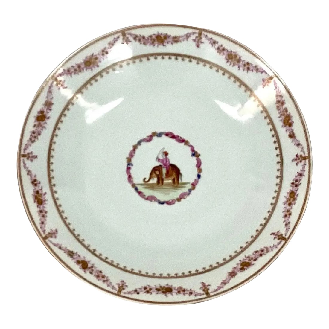 Large Chinese Export Famille Rose Porcelain Platter: Large 19th century Chinese Export famille rose porcelain platter. Qianlong Period, decorated with the figure of a mahout astride an elephant and flower sprays with gold rim. The theme of this lot