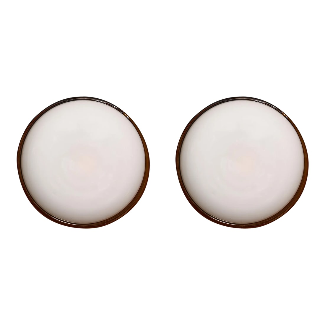 Murano Glass Ronda Sconces by Leucos: Sconces; Italian; from Leucos made of Murano glass. They are hand blown and are white in color with a tobacco colored rim around the outside. They have been newly wired to US standards. Condition: