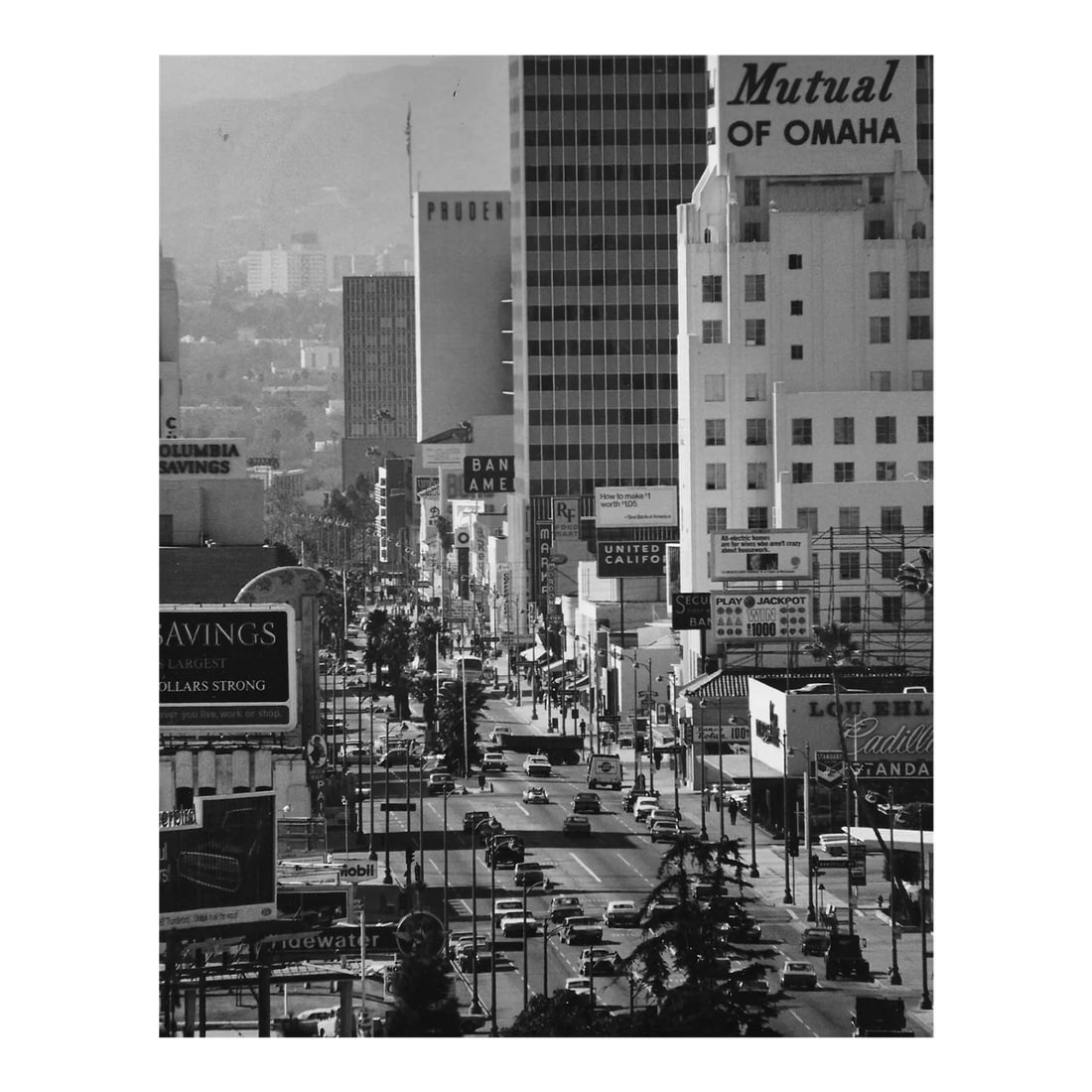 1965 Wilshire Boulevard Los Angeles Photograph: Wilshire near La Brea Avenue Los Angeles, California b&w photo by Don Coleman Ware (1921-2006). Title and Ware's stamp on back. Condition: Alterations: Original Condition Unaltered Imperfections: