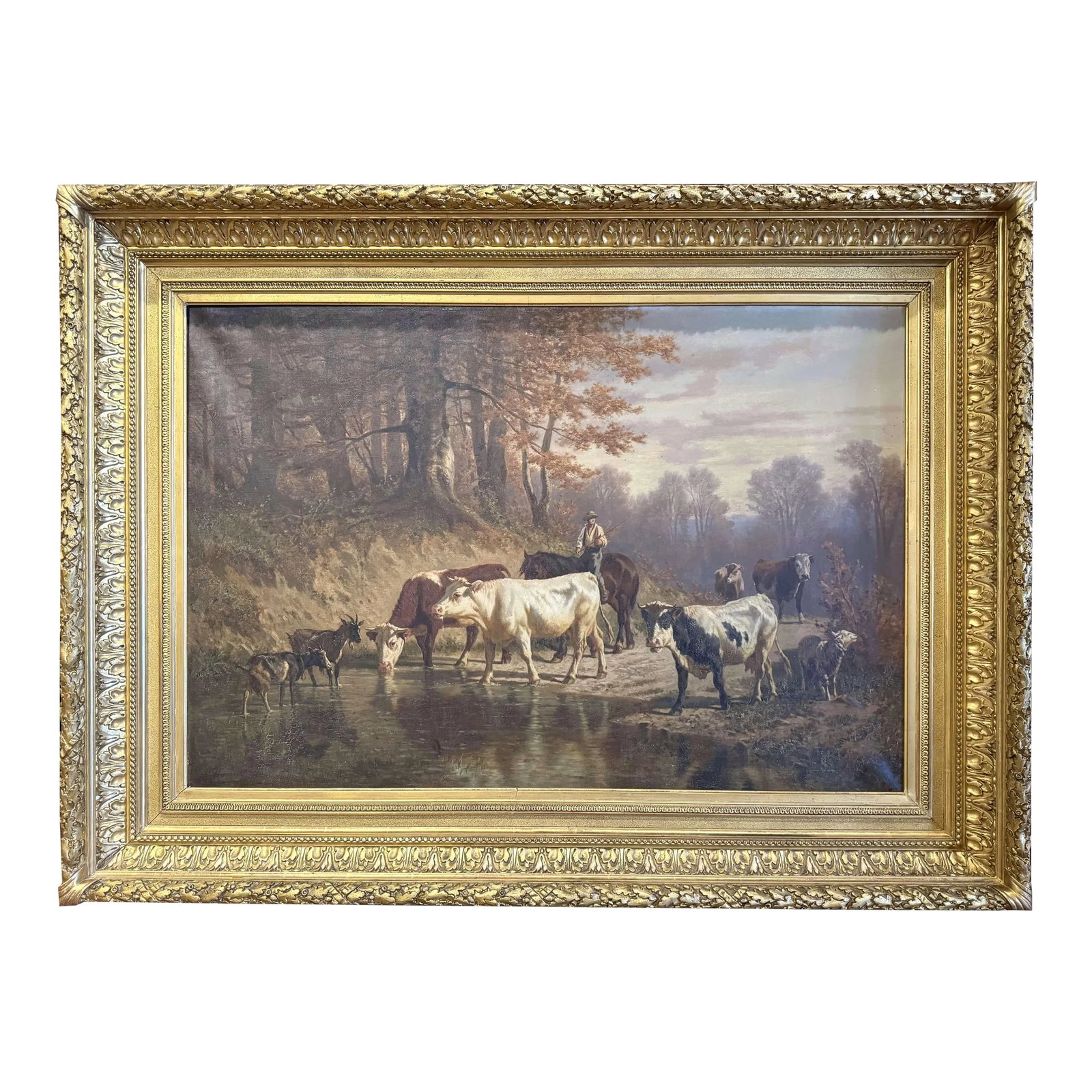 19th Century Swiss Pastoral Cow Painting Signed Charles Humbert in Frame: Decorate a den, study, or office with this impressive antique Swiss pastoral painting. Crafted circa 1875 and set in its original richly carved giltwood frame, the large horizontal canvas depicts a tr
