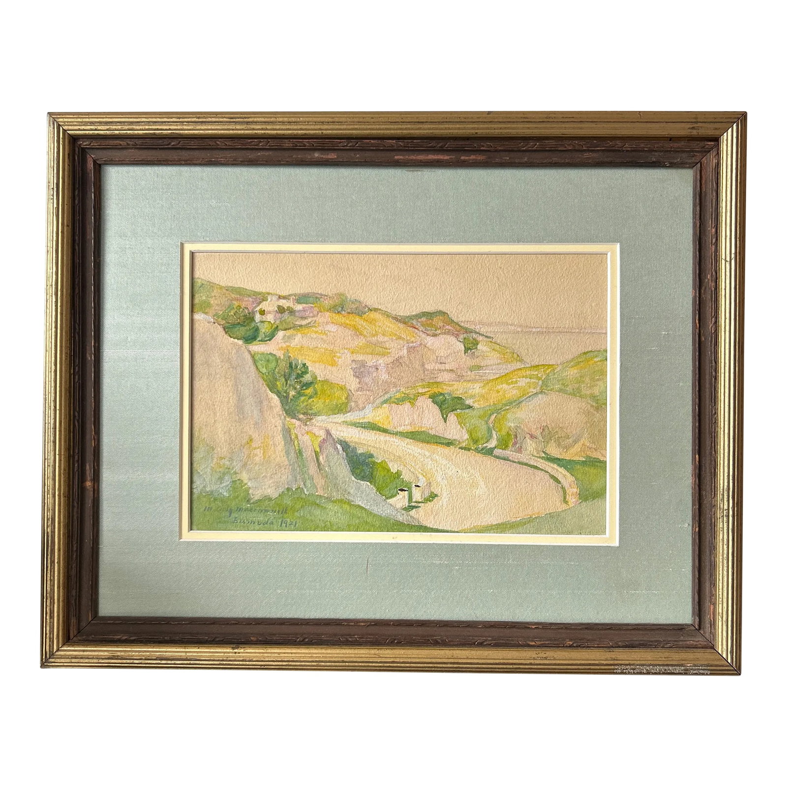 Artist M. Cully Macdonnell Hand Painted and Framed Water Color of Bermuda Signed Dated: Scenic water color with gently rolling hills in soft hues of greens and yellows. Beveled silk matting. Some marks on the teal matting but does not distract from the great feel of this wood framed