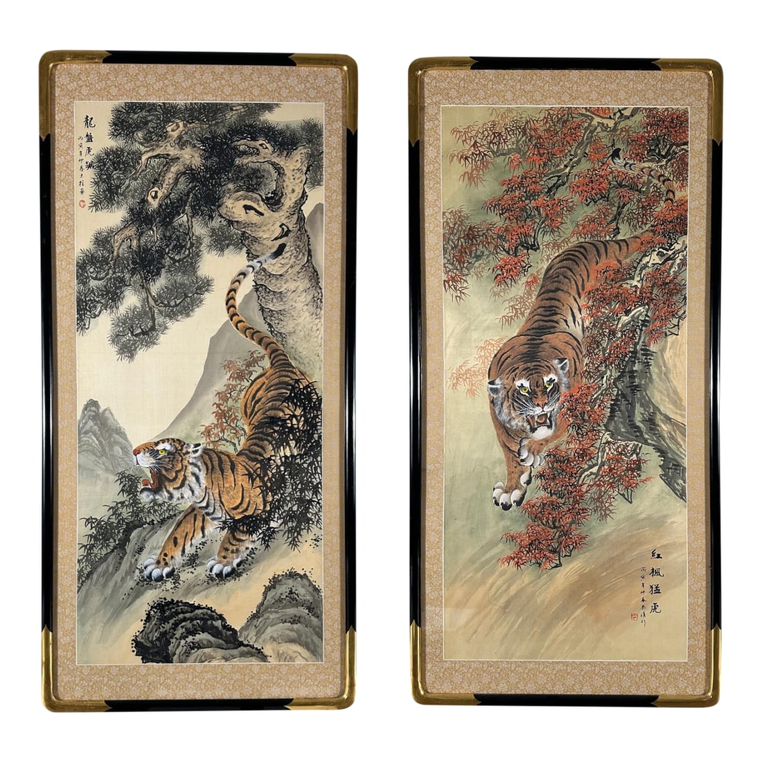 Pair of Signed Chinese Tiger Scroll Paintings, Ink on Silk, Ca. 1960: A pair of Chinese tiger scroll paintings set in black and gold frames with plexiglass fronts. Both paintings are signed. The production technique is ink on Silk. The frames have a gallery sticker with