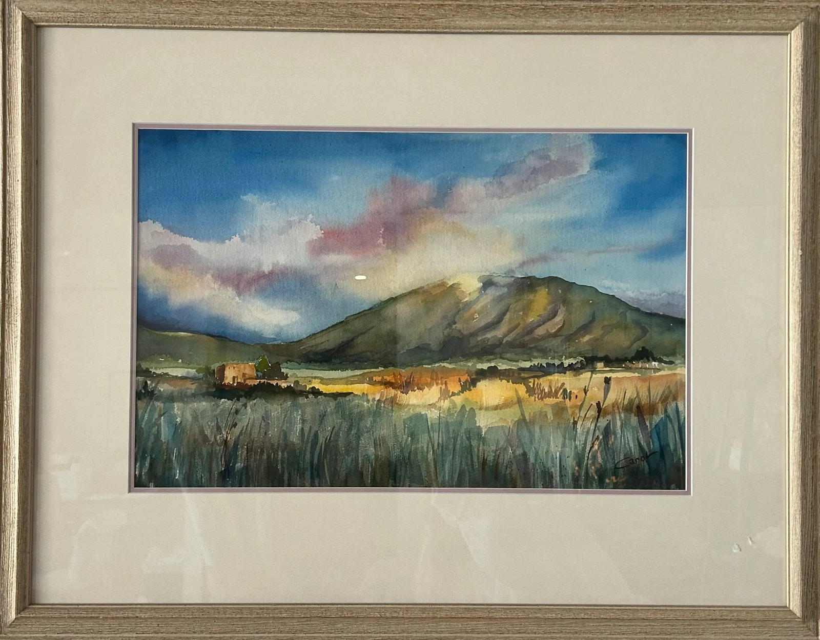 Landscape Watercolor, Framed & Signed: Framed & Signed Carol. Midcentury modern mid 20th century watercolor depicting a mountain landscape. Framed and matted. In great conditon. Gorgeous mix of blues and pastel colors. Measurements: 25.5" 