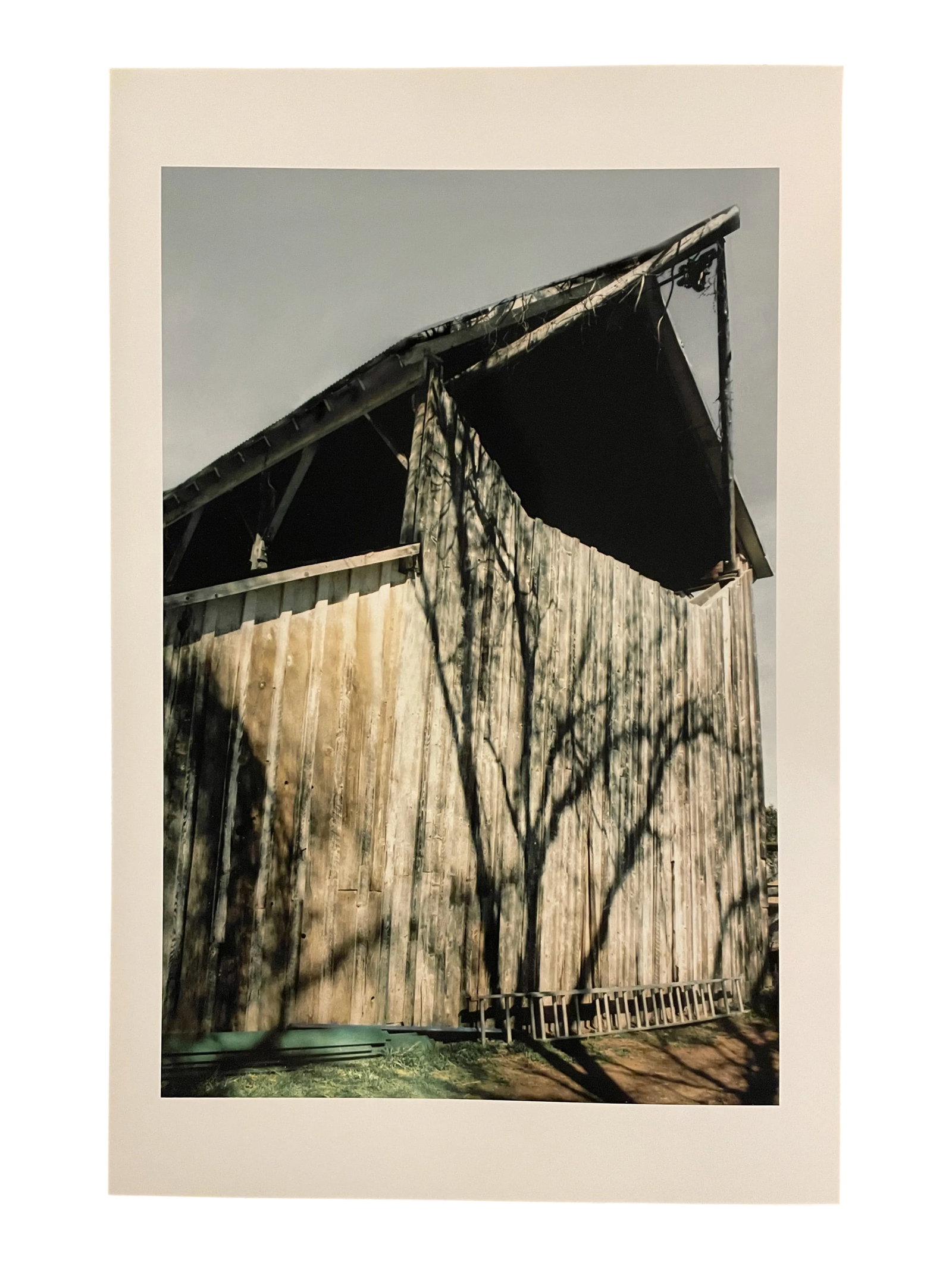 Gleb Derujinsky "Tree Shadow Barn" Contemporary Landscape Photograph Print: The pleasure of finally being able to go through the archive of my father, Gleb Derujinsky, and begin the task of sharing his vast imagination is a thrill. Many know his work now from his career as a 