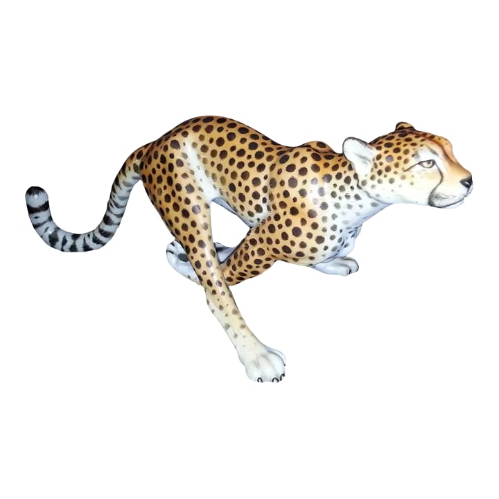 Herend Natural Cheetah Figurine: Majestic and bold, this running cheetah figurine is entirely handmade and hand-painted with natural coloring and a bisque finish. Made in Hungary of fine porcelain. Condition: Alterations: Original