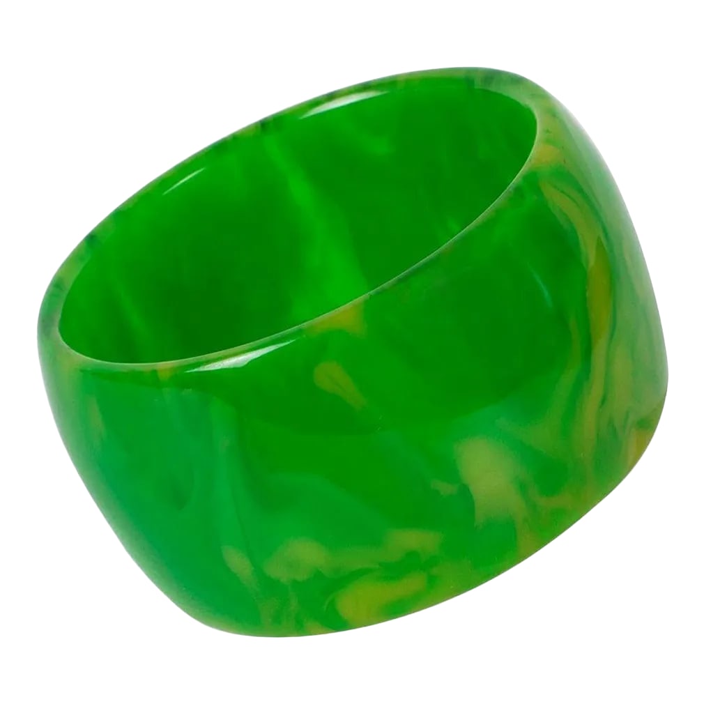 Bakelite Green Grass Marble Oversized Bangle Bracelet: This is part of Chairish's Costume Jewelry assortment. Gorgeous oversized green grass marble Bakelite bracelet bangle. Chunky wide domed shape. Intense green marble tone with yellow and white cloudy s