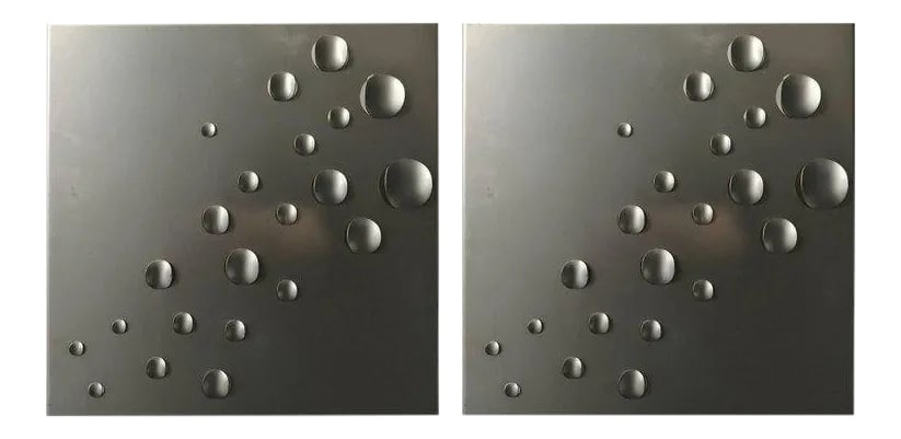 1960s Vintage Raak Rain Drops Dutch Wall Lights - a Pair: Pair of 1960s matte silver enamel over steel wall lights with rain drop decoration which is made to emit light. The open top and bottom also emit a good amount of light. Two standard sockets. Newly