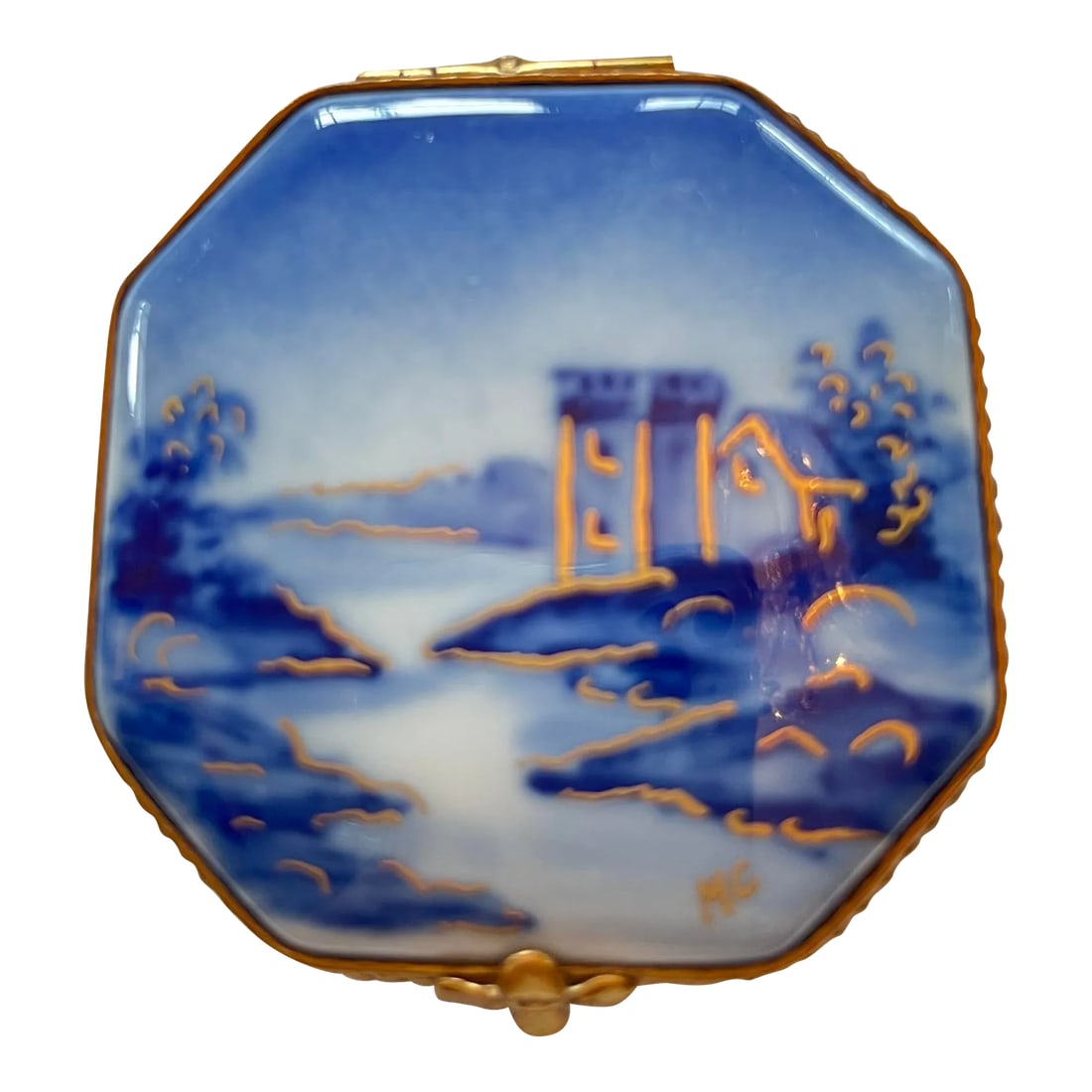 Early 20th Century Limoges Rochard Trinket Box: Octagonal trinket box made in Limoges,France. Hand painted and marked Rochard. Beautiful blues and white depict a house , trees and water scene and they are embellished with gold. The sides are a