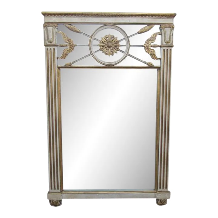 Neoclassical Style Italian Painted Mirror: Painted and gilt neoclassical style Italian mirror, c.1940's Painted and gilded, this mirror has reeded column sides and a decorative top. There is a circular central medallion flanked by two stylized