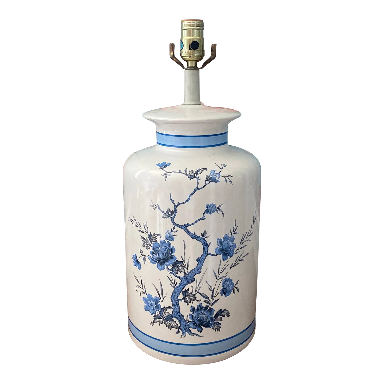 Late 20th Century Blue Chinoiserie Table Lamp: Listing is for a late 20th century chinoiserie style table lamp. The ceramic lamp is in the form of a tea canister with white glaze. A hand painted band of blue brightens up the lamp and accentuates t