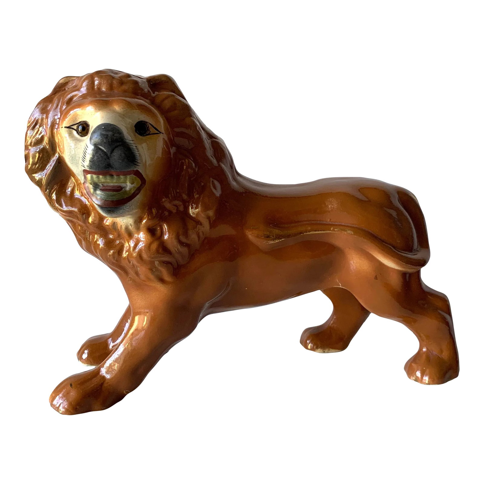 19th Century Standing Lion Staffordshire Figure, Circa 1880: Behold the regal and imposing 19th Century Standing Lion Staffordshire Figure, a magnificent testament to the craftsmanship of its era. Crafted around 1880, this commanding antique lion, once part of