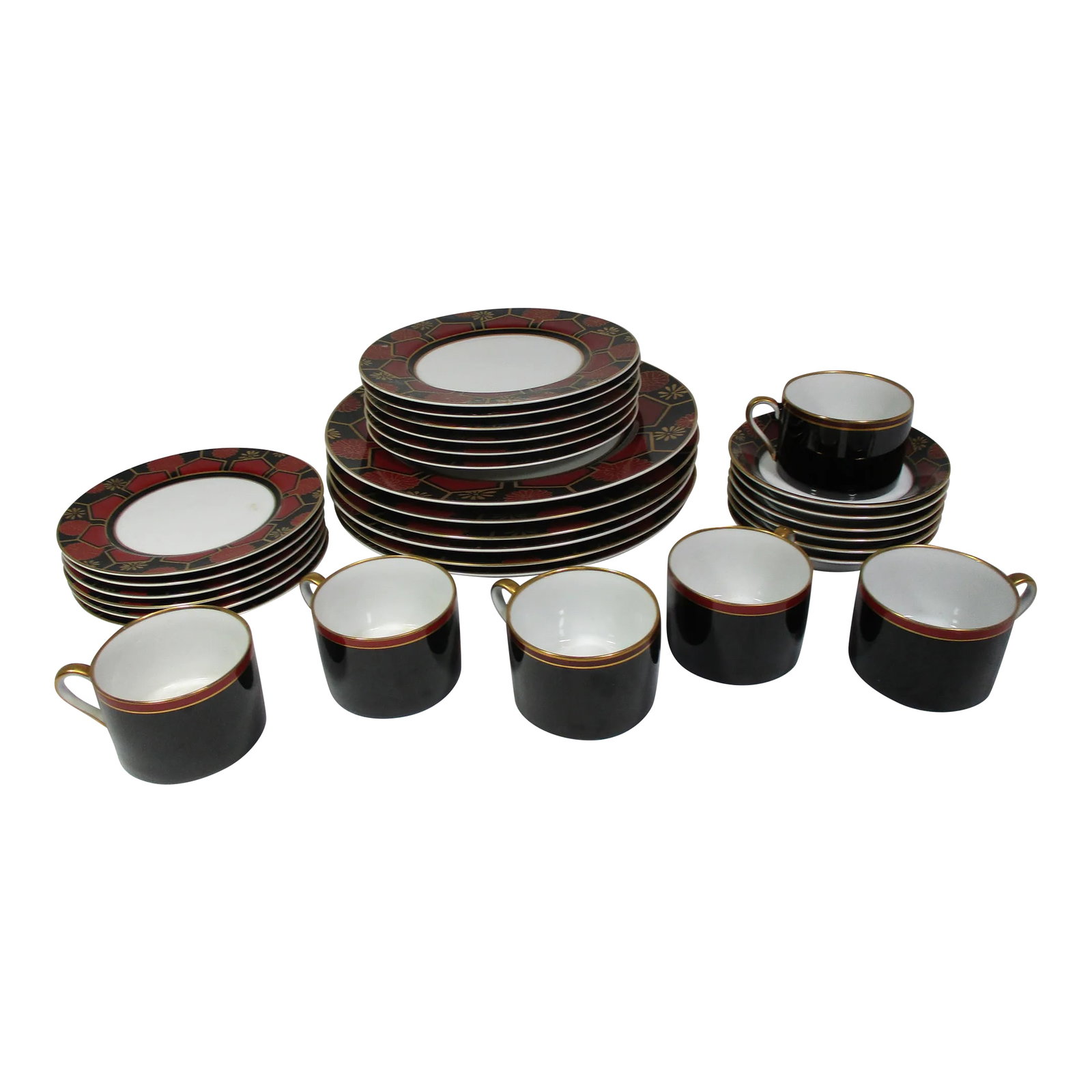 1970s Fitz and Floyd Kuruma Pattern Porcelain Dinnerware Service for Six- 30 Pieces: Asian inspired porcelain Fitz and Floyd " Kuruma" pattern dinner service for six. It is decorated with a floral and geometric design boarder in colors of black, red and gold with a gold trim edge. The