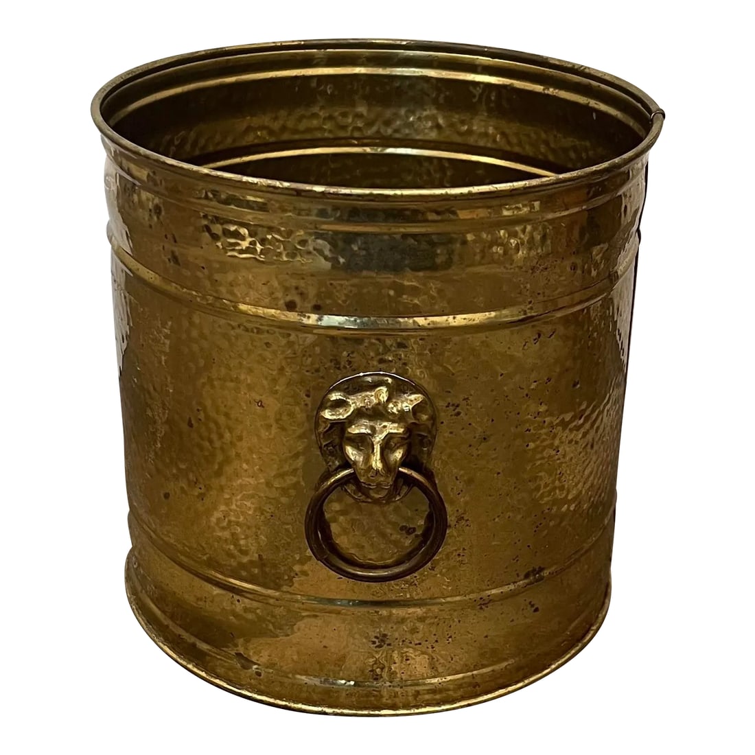 Lombard England Hammered Brass Lion Head Planter: Made by Lombard England, mid 20th century. Hand hammered, single sheet of thin brass held together well by circular molds at top and bottom. No leaks. Possible ice bucket at one point, has definitely