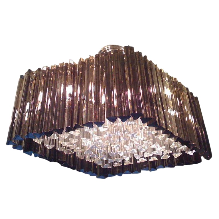 1960s Venetian Prism Chandelier: A Murano glass chandelier in a diamond shape composed of clear and smoked crystals on a chrome frame. Condition: Alterations: Restored Imperfections: Some Imperfections Condition Notes: Wear