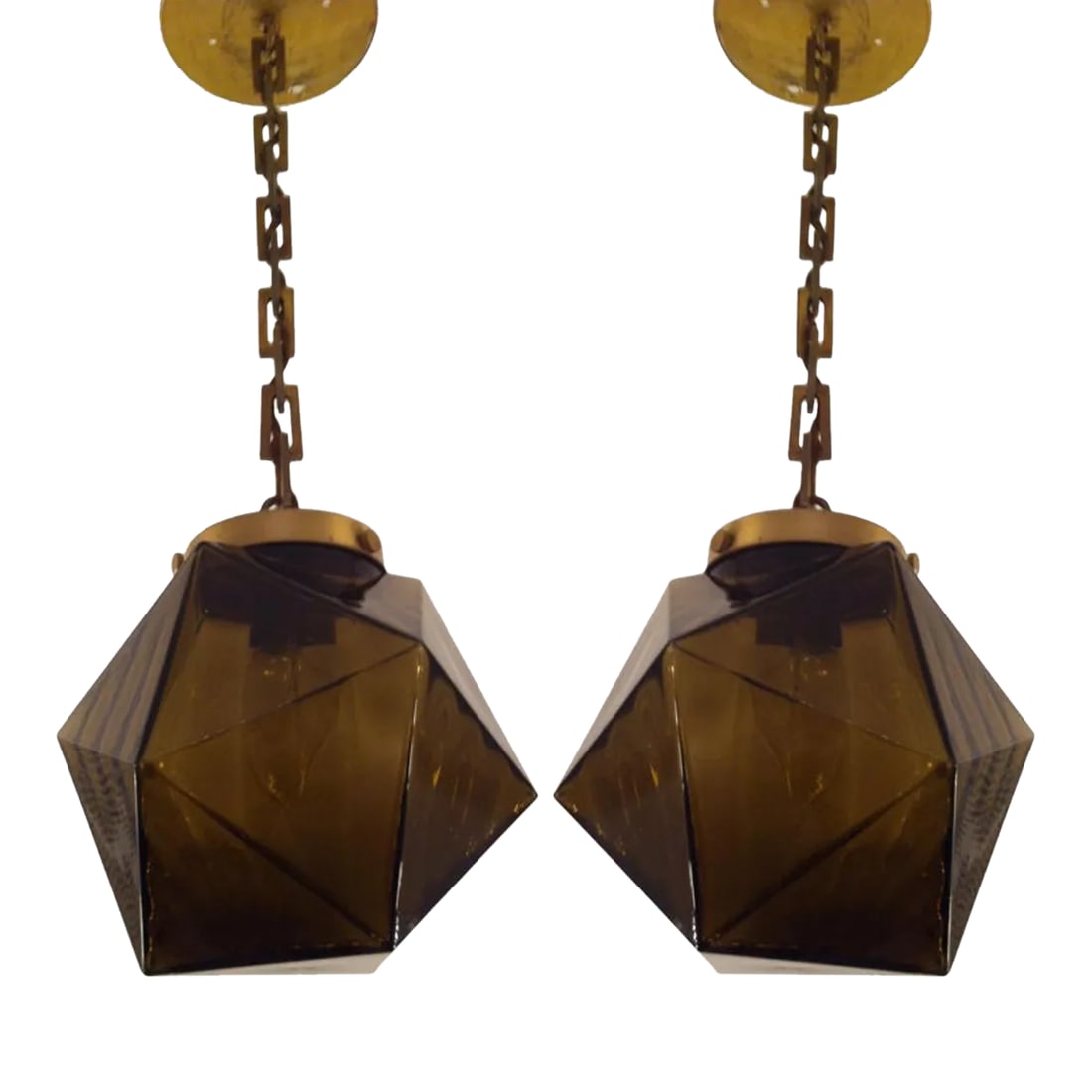 Pair of 1960s Smoked Glass and Brass Pendants: You are looking at a very cool pair of 1960s high style smoked glass gem fixtures with darkened brass fitting and chain. The colored glass of these pendants gives off a very vibey ambiance light to an