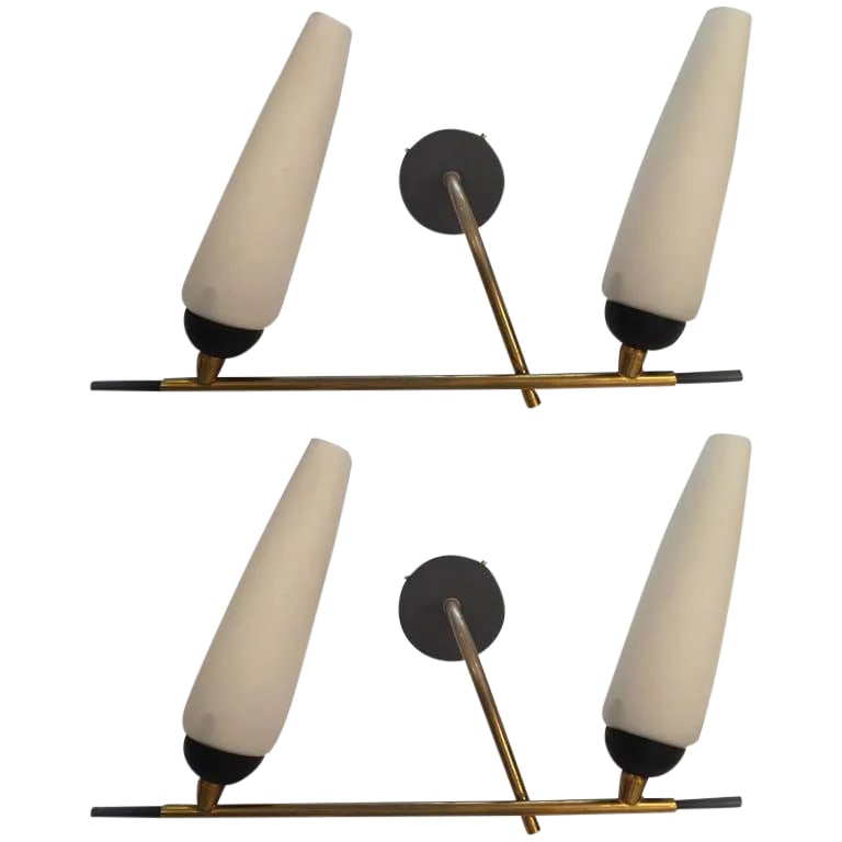 1960s French Lunel Wall Lights - a Pair: A great pair of French, 1960s sconces by Lunel. They are composed and an aged brass and black enamel frame holding white tube glass glades. Newly rewired. Condition: Alterations: Restored