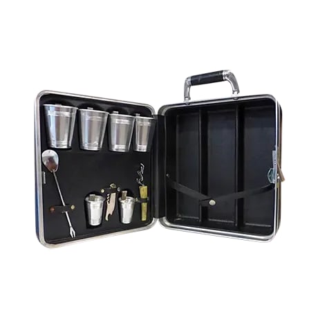 Mid Century Drinks Travel Kit: Great mid-century drinks case. Place for three bottles. Four small aluminium glasses 2.5 x 4, and two shot glass 1.5 x 2.5. Bottle opener 7in., wine opener, 4 in and spoon-fork 8.5 in. Condition: Cond