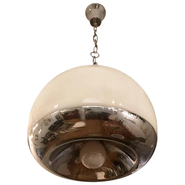 Lumi Italian 1970s Space Age Pendant: A white opaline glass and polished chrome Space Age pendant by the famed Italian lighting company, Lumi. Newly rewired. Condition: Alterations: Restored Imperfections: Some Imperfections Condition