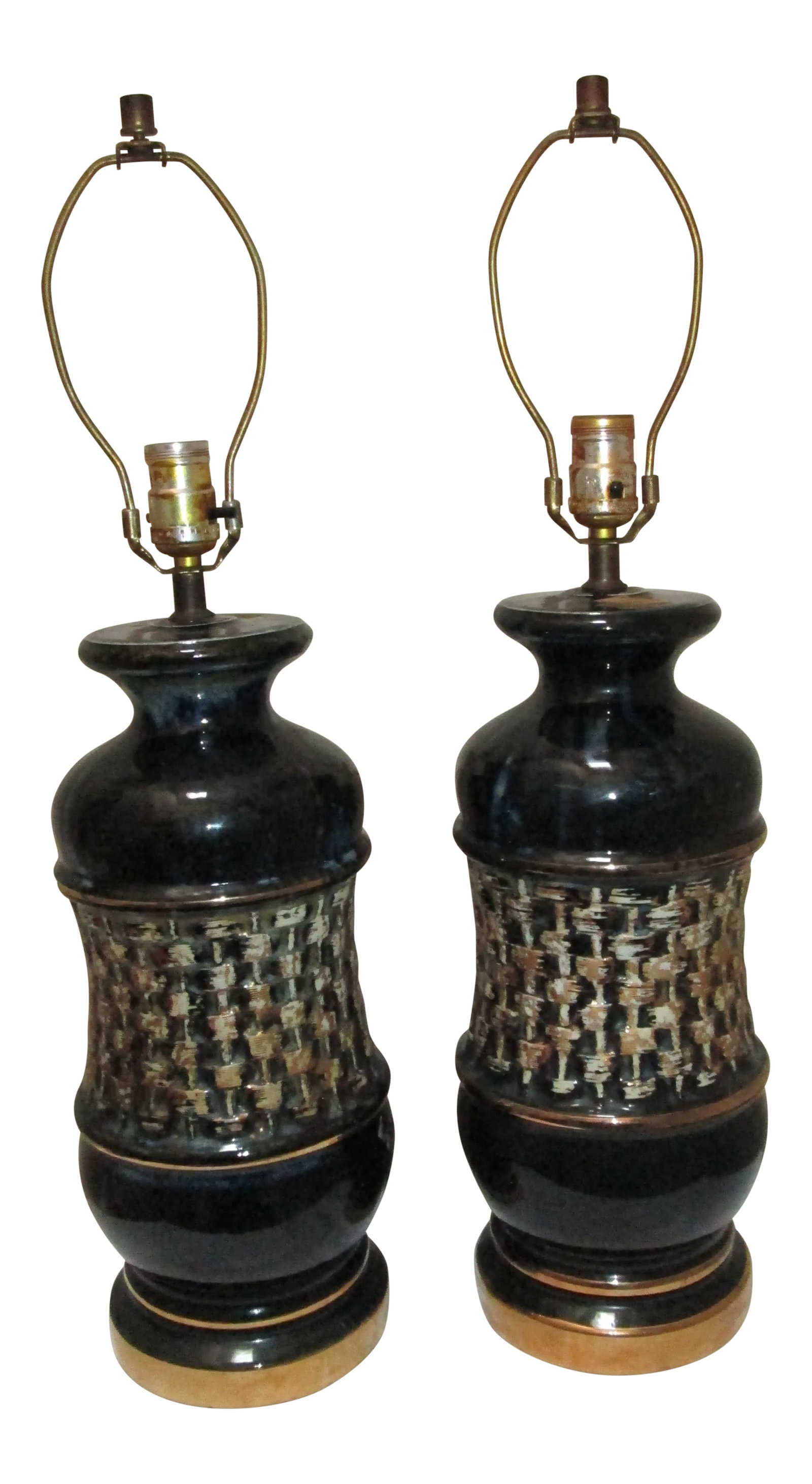 Mid Century Modern Black Ceramic Drip Gold Glaze Lamps - a Pair: 1960s, Hollywood Regency, Vintage. So collectible with the mid century feel but real contemporary design potential. These black ceramic lamps have an iridescent cast and a high glaze finish. The gold 