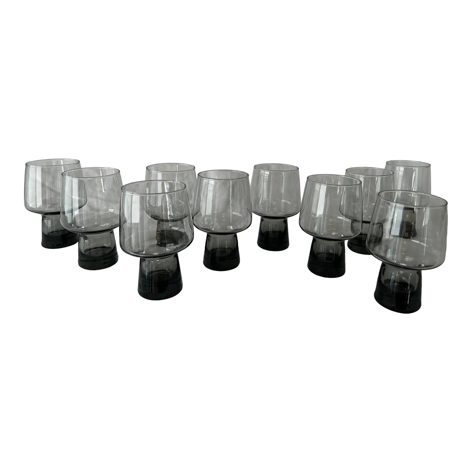 1970s Brutalist Smoked Grey Drinking Glasses by Libbey- Set of 10: Chic 1970's smoky grey stackable Libbey glasses! The unique shape of this glassware makes them incredibly versatile. They would work equally well for juice and water as they would for wine,