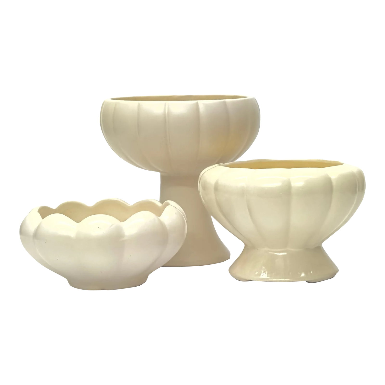 Mid 20th Century White Fluted Ceramic Planters - Group of 3: White scalloped vessels, group of 3. This set of cream art deco vases feature a fluted scalloped design. Shortest: 3.25"H Tallest: 7.5" Condition: Alterations: Original Condition Unaltered