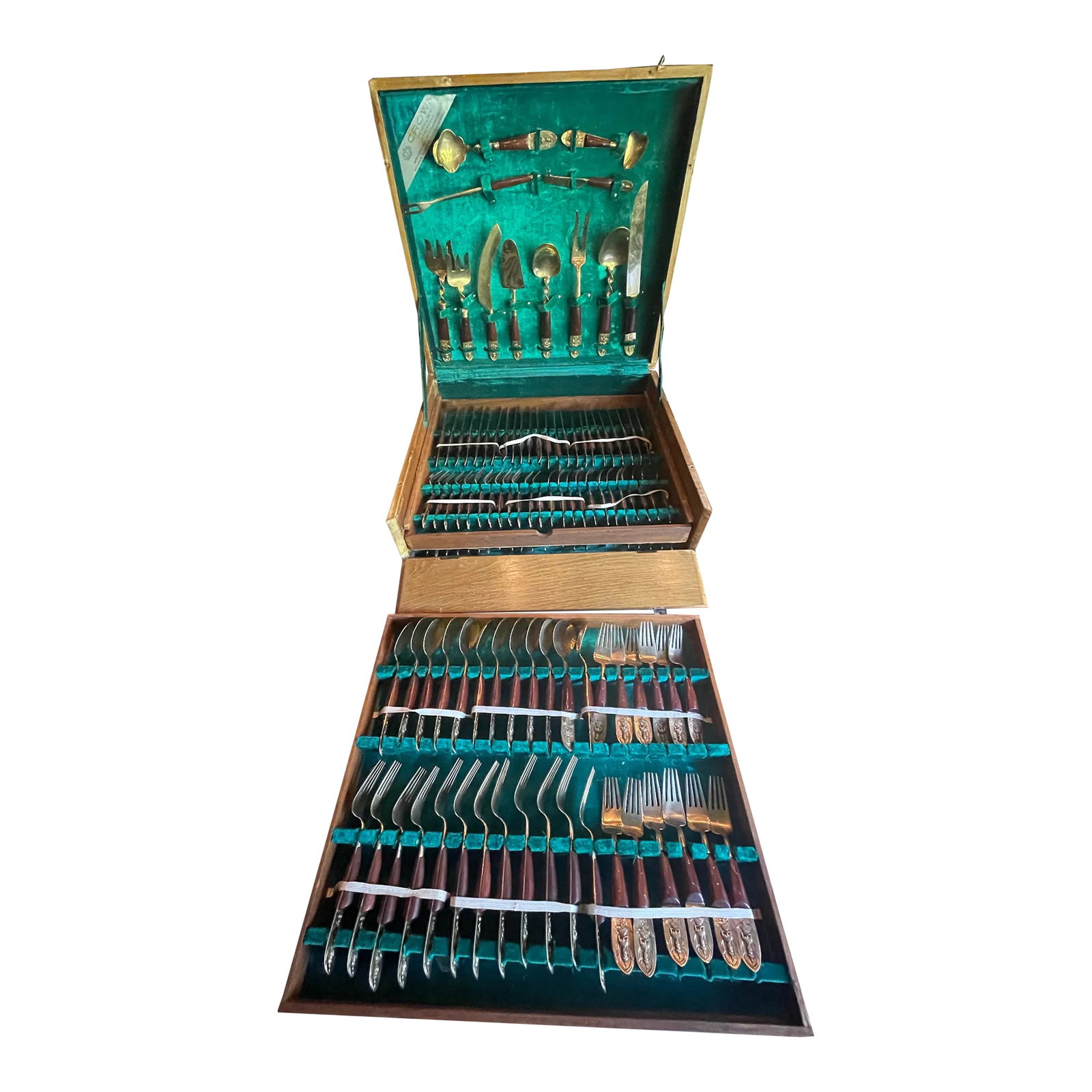 Mid-Century Modern Rosewood and Brass Flatware Set- 162 Pieces: Fantastic Mid-Century Modern flatware set from Thailand (Siam). Rosewood and Brass. Twelve 12-piece place setting plus 13 serving pieces (one butter knife missing from one place setting). Original gre
