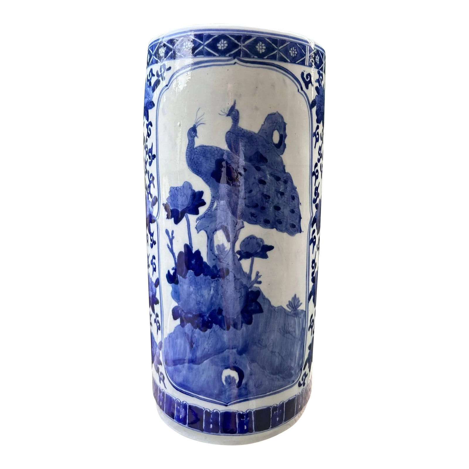 Mid 20th Century Chinese Qianlong Blue White Chinoiserie Peacock Floral Porcelain Cane Umbrella Stan: Chinese Qianlong blue & white chinoiserie peacock floral glazed porcelain umbrella stand holder. A stunning peacock motif on both sides with an exquisite floral ground. The heavy piece is cylinder in 