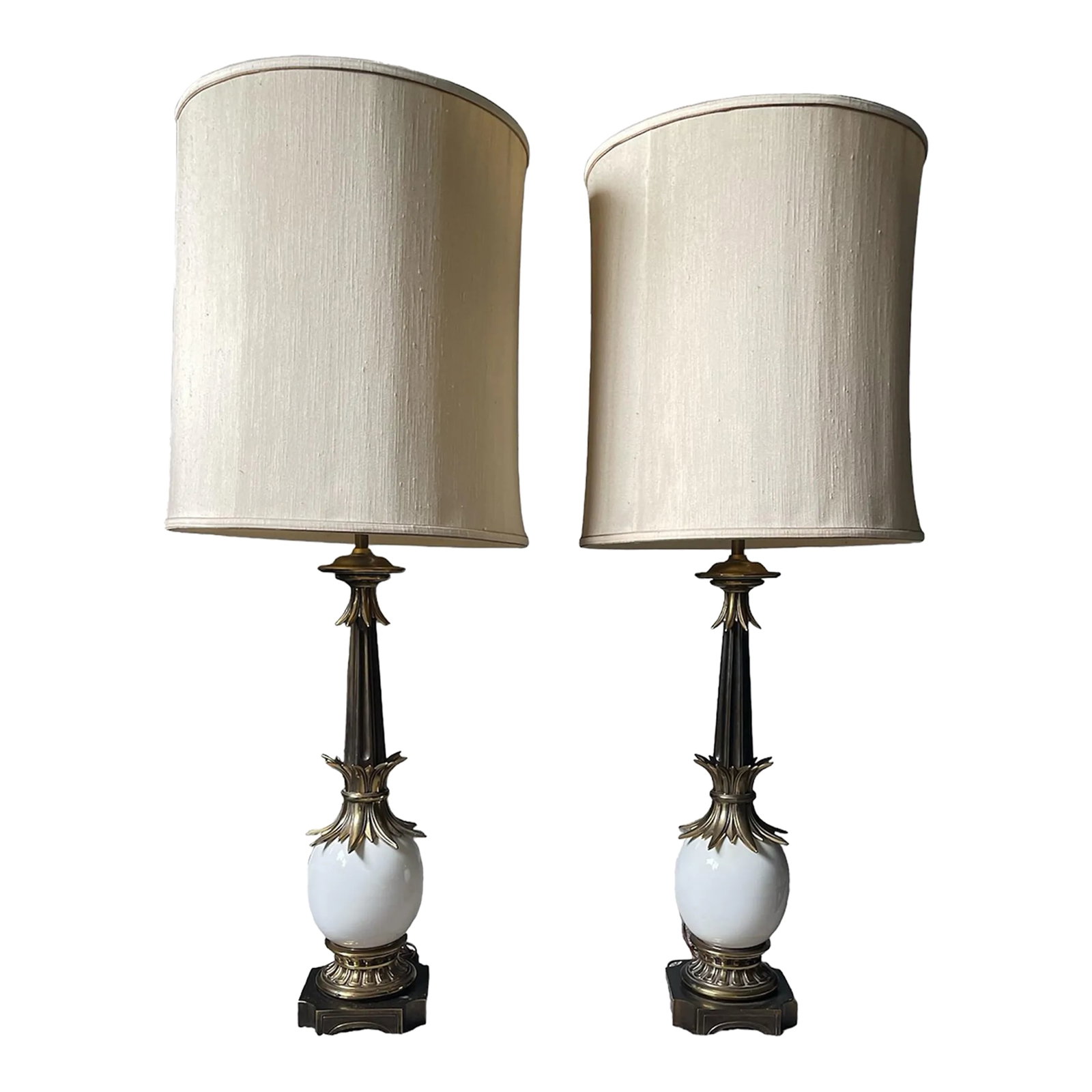 Mid Century Hollywood Regency Stiffel Ostrich Egg Lamps- a Pair: ORIGINAL Pair of Stiffel Ceramic Ostrich Egg lamps from the 1950s. Hollywood Regency Glamour Style. These lamps are complemented by solid brass and pewter toned accents. Some minor discoloration on th