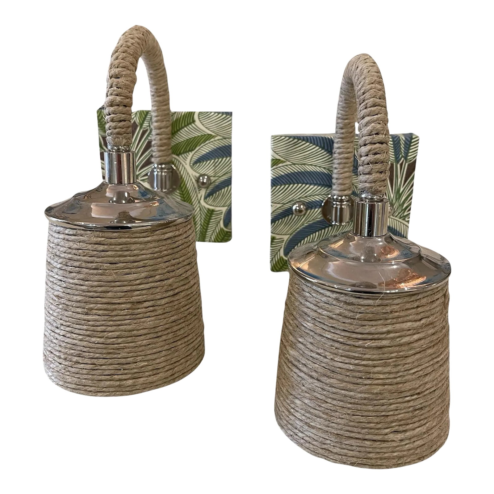 Pair of Customized Wall Sconces by Regina Andrews: Enhance your coastal-inspired decor with the timeless elegance of the Treble Sconce. This exquisite piece features a classic bent arm silhouette, beautifully adorned with a bamboo-wrapped design that