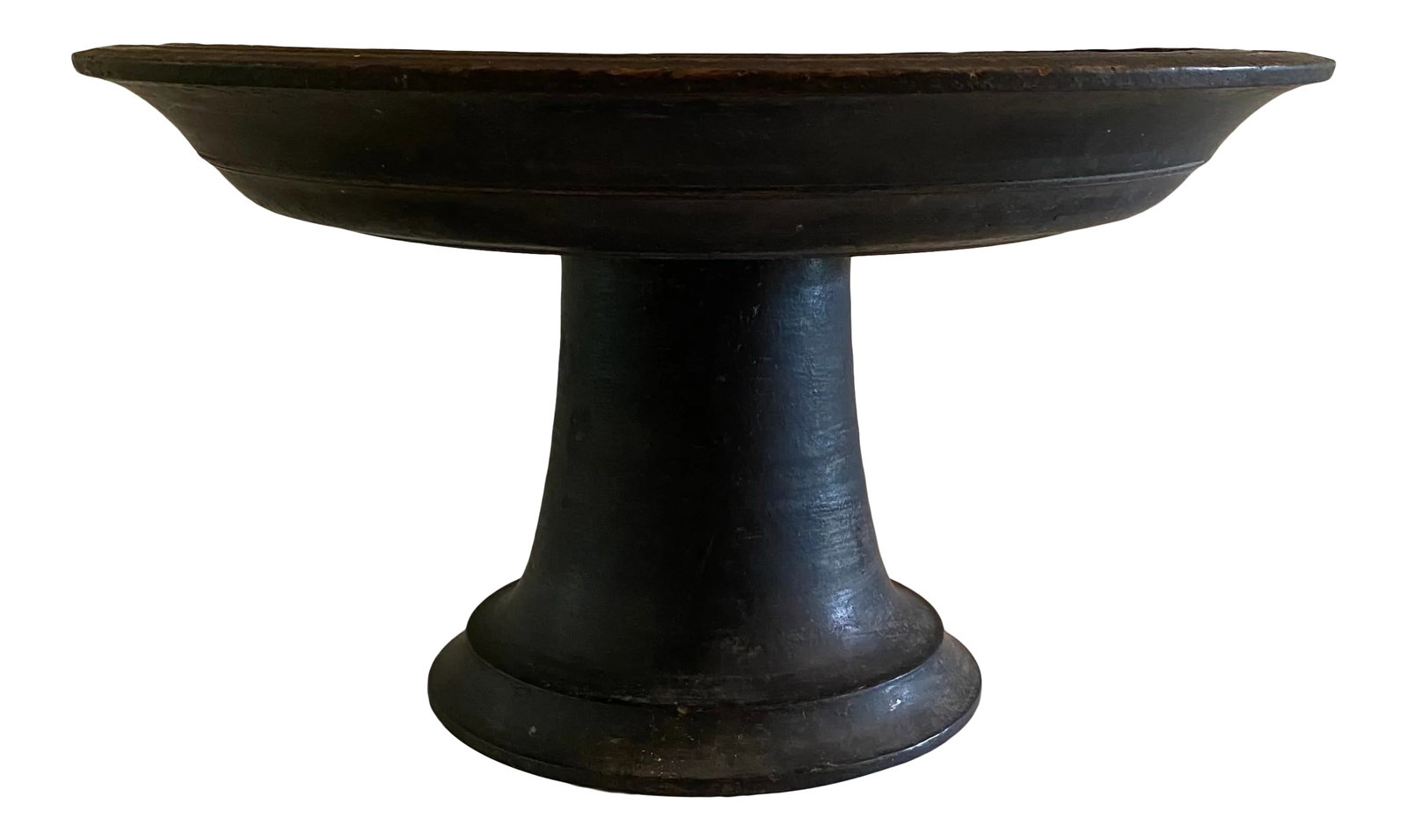 Early 20th Century Antique Hand Carved Teak Offering Tray: Antique circa 1880-1910 hand-carved/turned wooden raised tray from Indonesia. Made with solid teak wood. Used to offer food and flowers to the temple Condition: Alterations: Original Condition