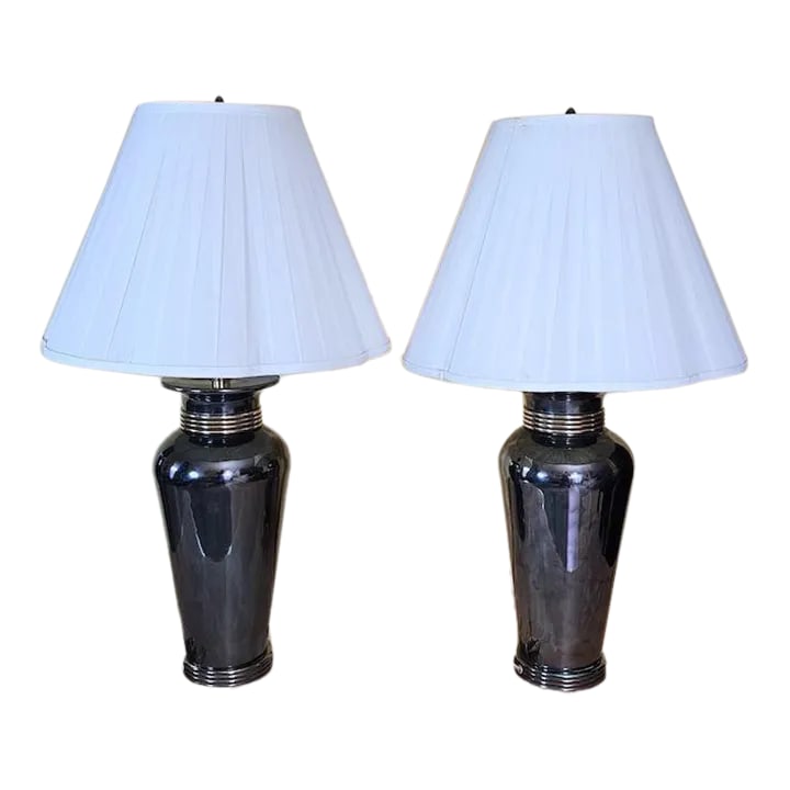 1990s Ethan Allen Hollywood Regency Cobalt Blue Ginger Jar Table Lamps, a Pair: A rare striking pair of tall vintage Ethan Allen ginger jar table lamps crafted from enameled steel in a rich cobalt blue finish, featuring subtle silver undertones and elegant gold trim at the base a