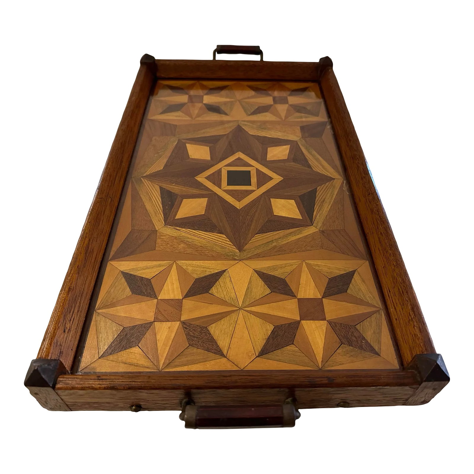 1930's Inlay Tray With Wood Handles and Removable Glass.: Beautifully Arts and Craft made tray with over 300 individually cut pieces in over 8 spices of wood. All laid onto a solid piece of wood wrapped in mahogany frame with little corner turrets finished
