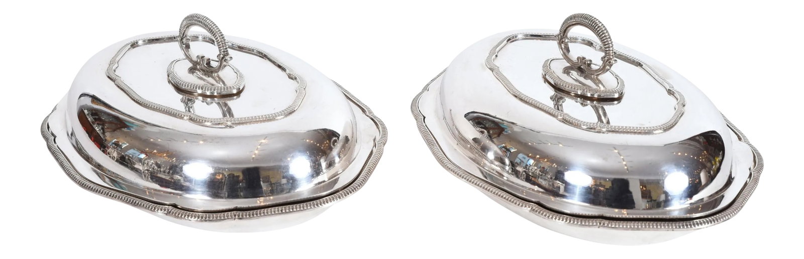 Vintage English Silver Plated Tableware Dishes or Server - a Pair: Vintage pair of English silver plated / copper covered tableware entree dishes / server. Each one is in excellent vintage condition, maker's mark undersigned. Each covered dish measure about 11.5 inch