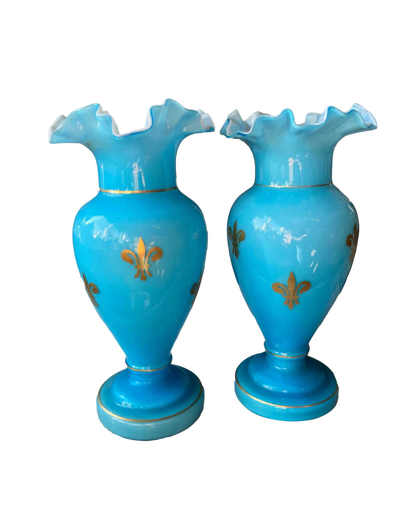 Late 19th Century French Blue Vases - a Pair: A pair of French blue vases with gilt fleur de lis. These circa 1880 vases are stunning with their scalloped rim. They are sure to add a touch of elegance to any space. Condition: Alterations: