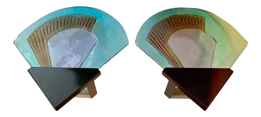 1980s Itre Murano Glass Wall Lights - a Pair: A pair of hand blown sky blue Murano Glass sconces with black enamel frames. Newly rewired. Condition: Alterations: Original Condition Unaltered Imperfections: Some Imperfections Condition Notes: