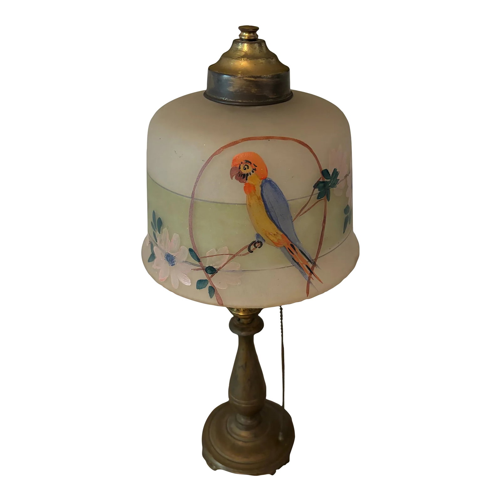 Early 20th Century Moe-Bridges Hand Painted Boudoir Lamp: Nice hand painted parrot and flowers on a frosty shade on a brass lamp with harp and finial. The painting is actually on the outside of the shade instead of the inside, which is unusual. It has origin