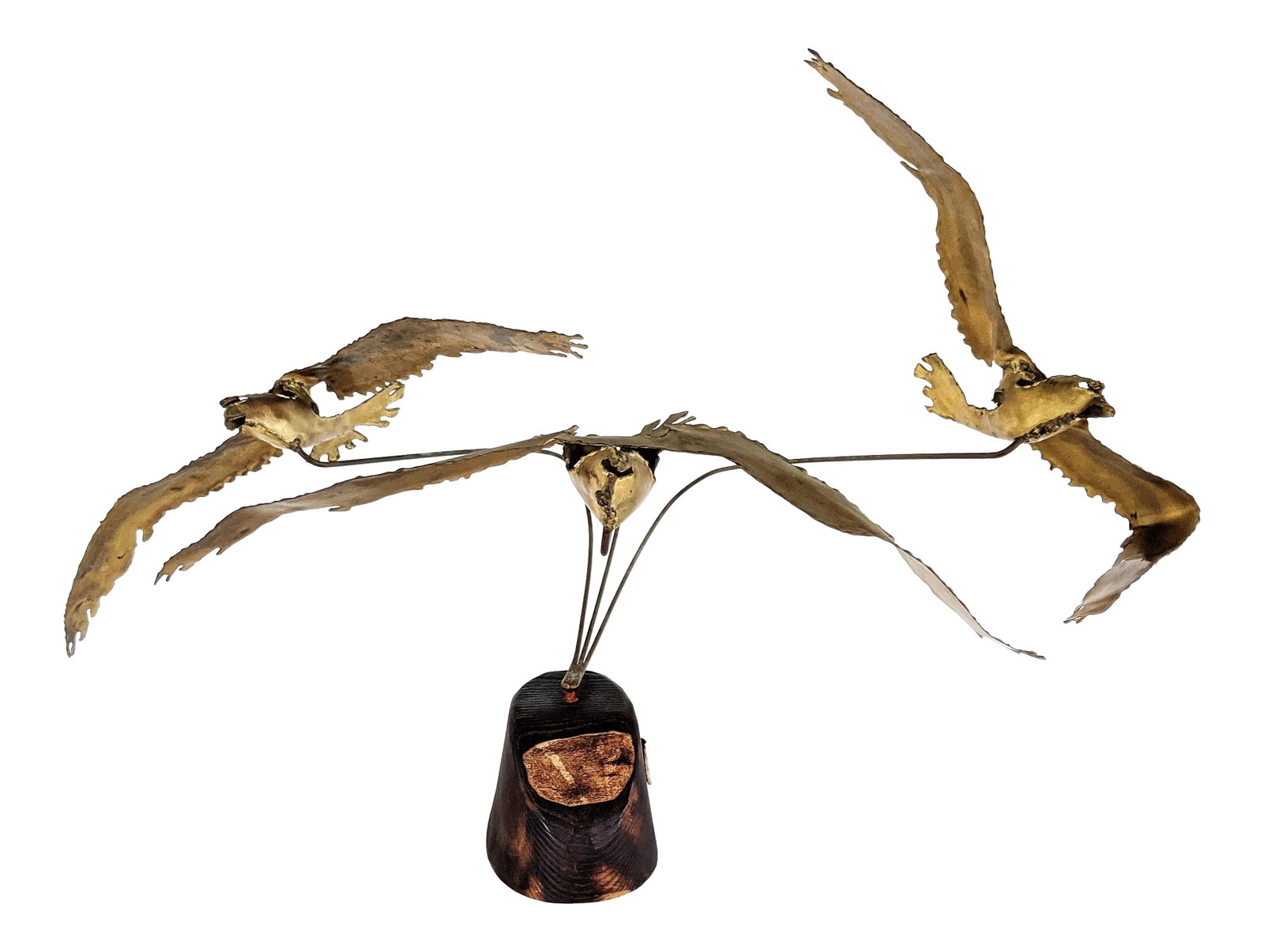 Flying Seagulls Brass Table Sculpture by Ratafia: Dynamic brass sculpture of flying seagulls. Mounted on a wooden base. Brass tag reads "Ratafia" Condition: Alterations: Original Condition Unaltered Imperfections: Some Imperfections Condition Notes: 