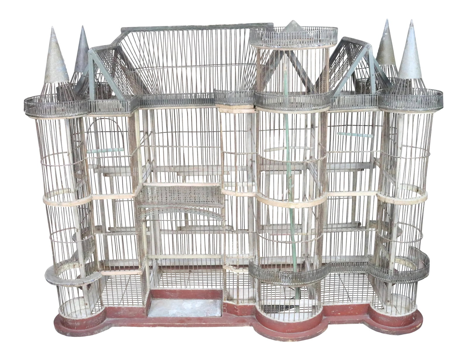 19th Century French Chateau Birdcage: An exceptionally ornate Napoleon III birdcage in the form of a chateau with four turrets and walk ways, a bell tower, and a covered portico. It is in very good as found condition with its original