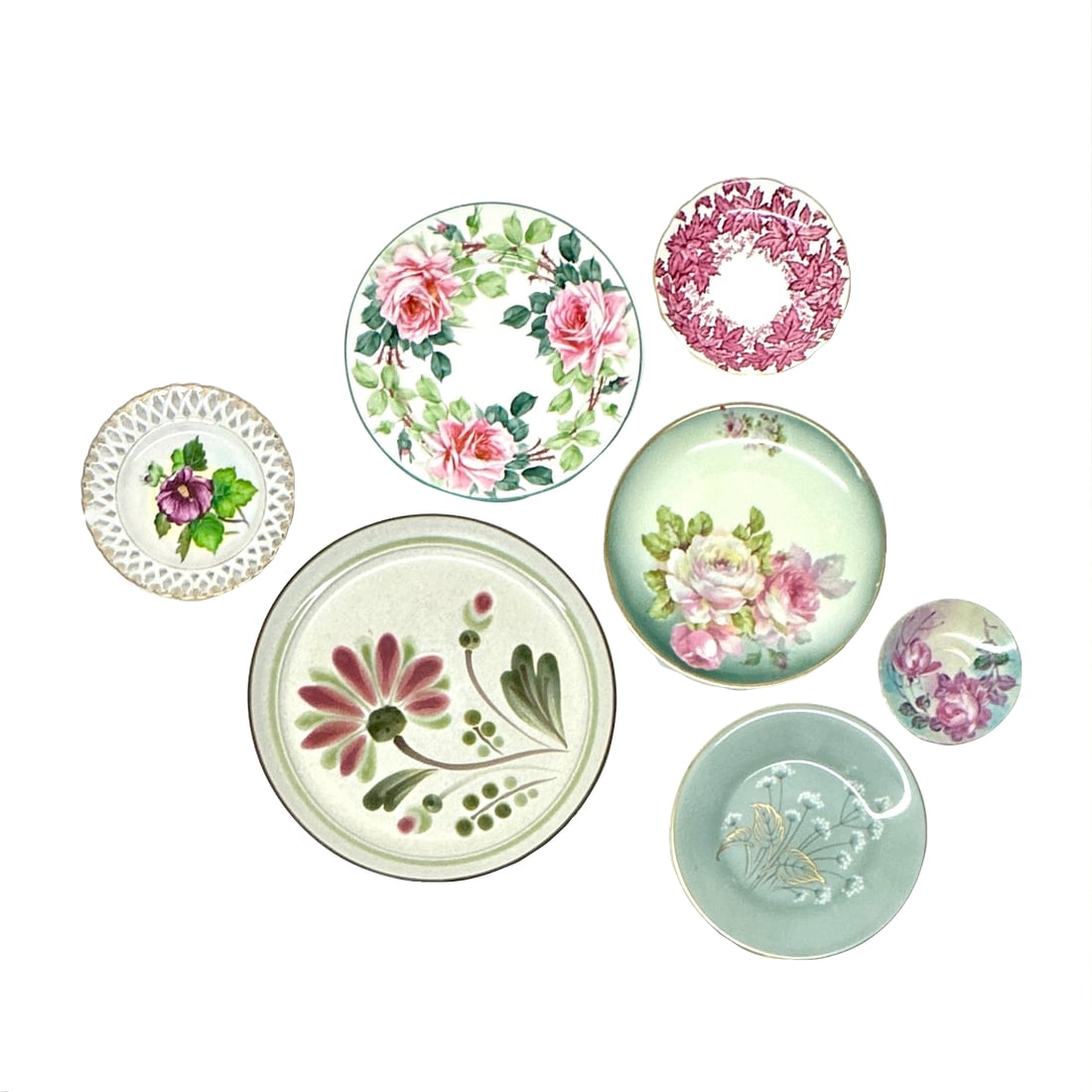Dusty Teal & Magenta Vintage Floral Wall Plate Curation - Group of 7: Mixed petal teal and magenta decorative plates, group of 7. This beautiful set of decorative plates comes in a variety of designs and sizes with an overall floral magenta, muted teal, and white