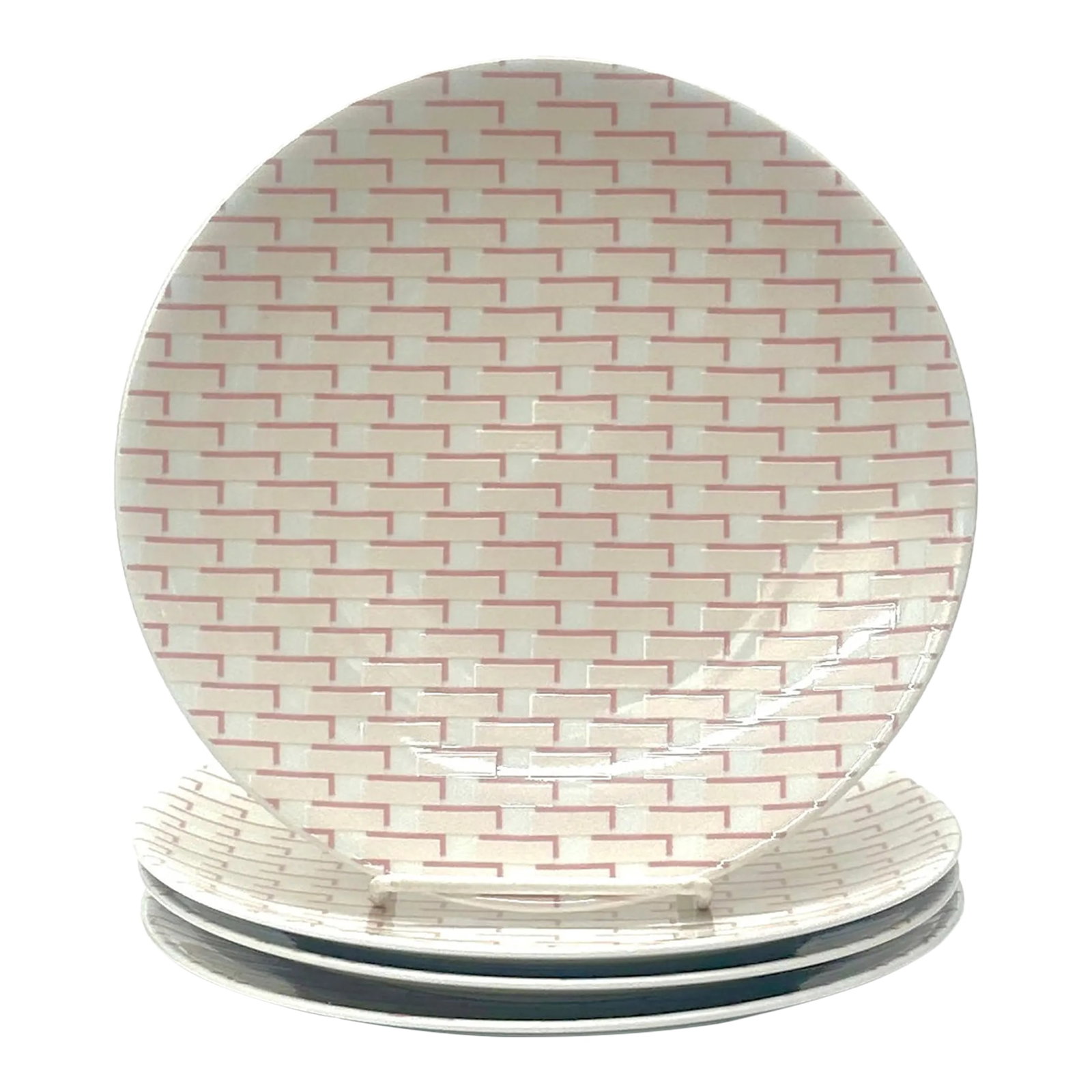 All Over Graphic Pattern Side Plates 'Foley Square Pink' by Studio Nova - Set of 4: Pink graphic dinner plates, group of 4. Studio Nova crafted this set of four dinner plates in the early 2000s. Each plate from the "Foley Square Pink" line showcases a white backdrop adorned with a